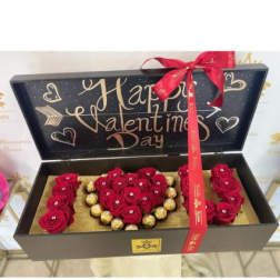 Heart-shaped rose gift box with chocolates and a Valentine’s Day message