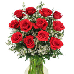 Bouquet of red roses in a clear glass vase