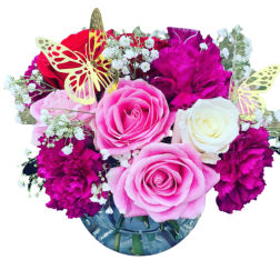 Pink and white roses with magenta carnations in a glass vase
