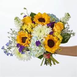 Handheld bouquet with sunflowers, yellow roses, hydrangeas, and white chrysanthemums