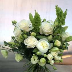 Bouquet of white roses and green blooms with long stems