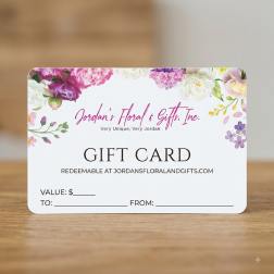 Floral gift card with pink and purple blossoms around the border