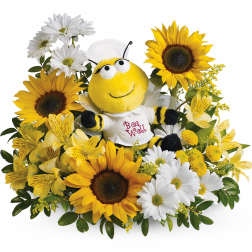 Sunflower and daisy arrangement with a plush bee in the center