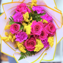 Bouquet of hot pink roses and carnations with yellow filler flowers