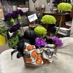 Halloween floral basket with purple carnations and green chrysanthemums