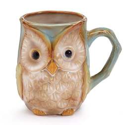 Ceramic owl-shaped mug with a handle