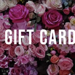 Pink and white roses with hydrangea behind the words "GIFT CARD"