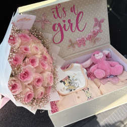 Pink rose bouquet with a plush bunny and baby clothes in a gift box