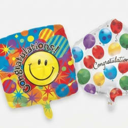 Three square congratulatory balloons with colorful patterns and text