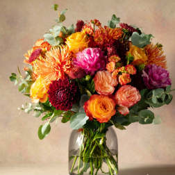Colorful mixed bouquet in a clear glass vase