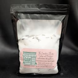 Bag of lavender bergamot frankincense bath salt with a pink label