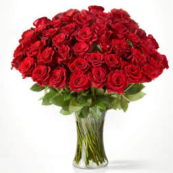 Bouquet of red roses in a clear glass vase
