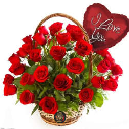 Basket of red roses with a heart-shaped "I Love You" sign