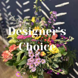 Mixed bouquet with yellow, pink, purple, and coral flowers