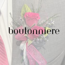 Pink rose boutonniere with ribbon and netting