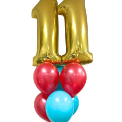 Gold number 1 balloon above a cluster of red and blue balloons