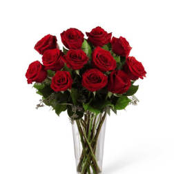 Bouquet of red roses in a clear glass vase