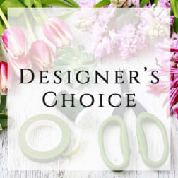 Designer’s Choice floral arrangement with pink and white blooms and green accents
