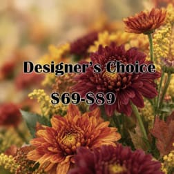 Autumn bouquet of burgundy and orange chrysanthemums with yellow filler flowers