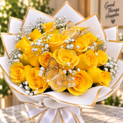 Yellow rose bouquet with white baby's breath and butterfly decorations