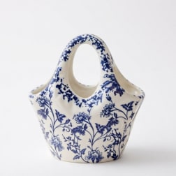 Blue and white ceramic basket-shaped vase with floral pattern