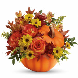 Pumpkin-shaped arrangement with roses and yellow daisies