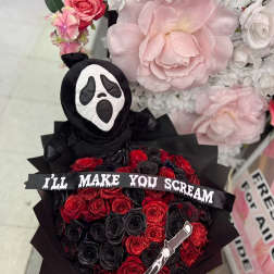 Black bouquet with red roses and a Ghostface plush topper