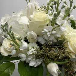 White rose bouquet with tulips and small white blossoms
