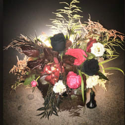 Mixed bouquet with black, pink, white, and burgundy flowers