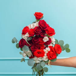 Bouquet of red and white roses with eucalyptus