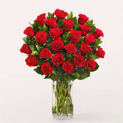 Bouquet of red roses in a clear glass vase