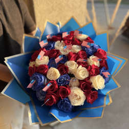 Bouquet of red, white, and blue roses with small American flags