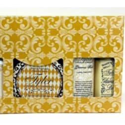Gold patterned gift set with wash, candle, and lip balm