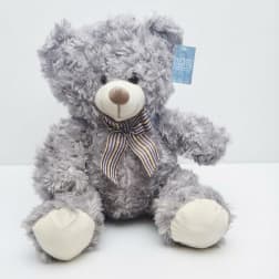Gray plush teddy bear with a striped ribbon bow