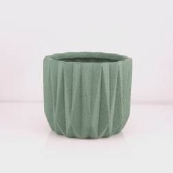 Green textured ceramic planter pot on a white background