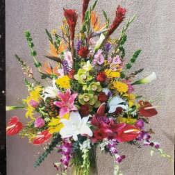 Colorful mixed flower arrangement in a glass vase