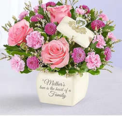 Pink roses and carnations in a cream vase with a Mother's Day message