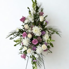 Tall floral standing spray with white and lavender roses and white mums