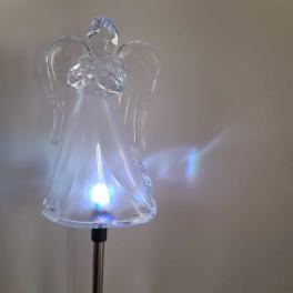 Clear glass angel figurine on a metal stand