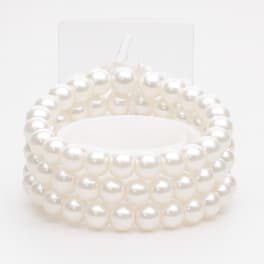 White pearl beaded bracelet stacked in multiple rows