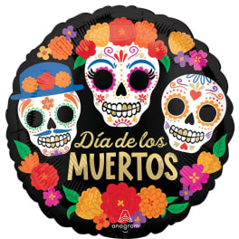 Round Día de los Muertos balloon with three decorated sugar skulls