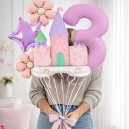 Pastel birthday balloon bouquet with a castle, flowers, star, and number 3