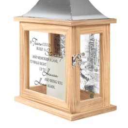 Wooden memorial lantern with a metal top and printed quote