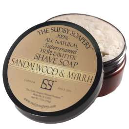 Tin of sandalwood and myrrh shave soap with lid on top