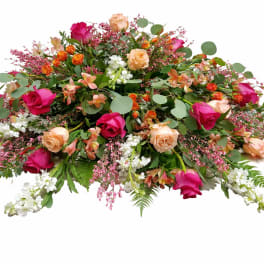 Large mixed bouquet of pink and peach roses with white flowers