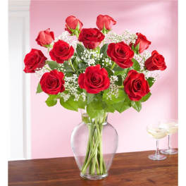 Bouquet of red roses in a clear glass vase