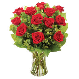 Bouquet of red roses in a clear glass vase