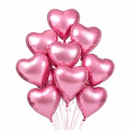 Cluster of pink heart-shaped balloons on strings