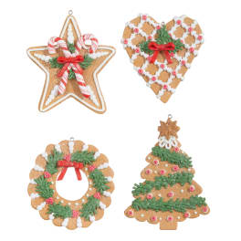 Four decorated gingerbread Christmas ornaments on a white background