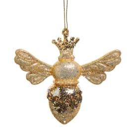 Gold glitter bee ornament with wings and a crown hanging by a cord